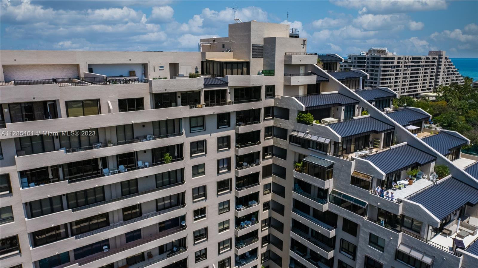 151 Crandon Boulevard, Unit 1023 Key Biscayne, FL 33149 - Photo 13 of 55 a front view of a building