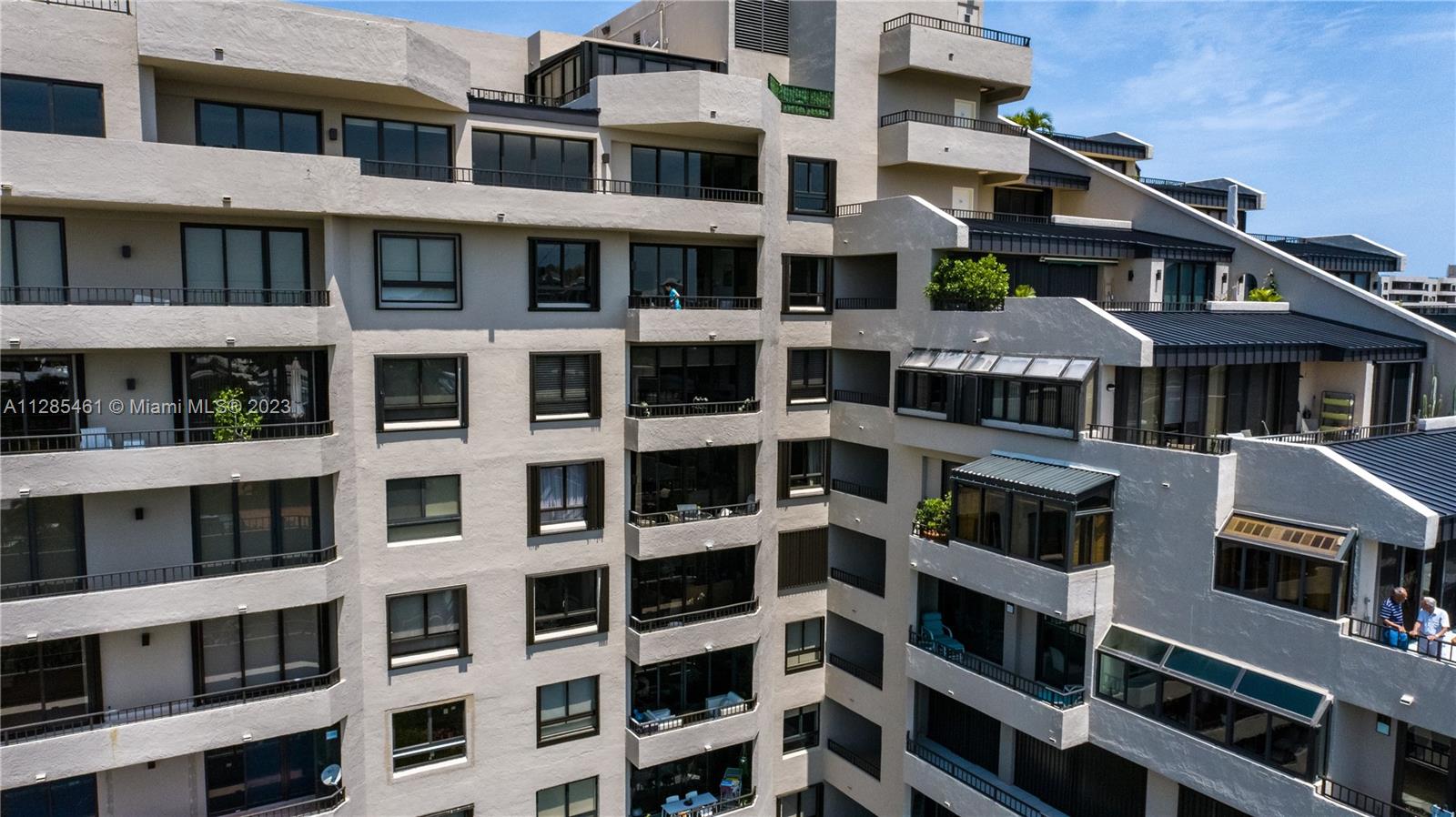 151 Crandon Boulevard, Unit 1023 Key Biscayne, FL 33149 - Photo 20 of 55 a front view of a multi story building