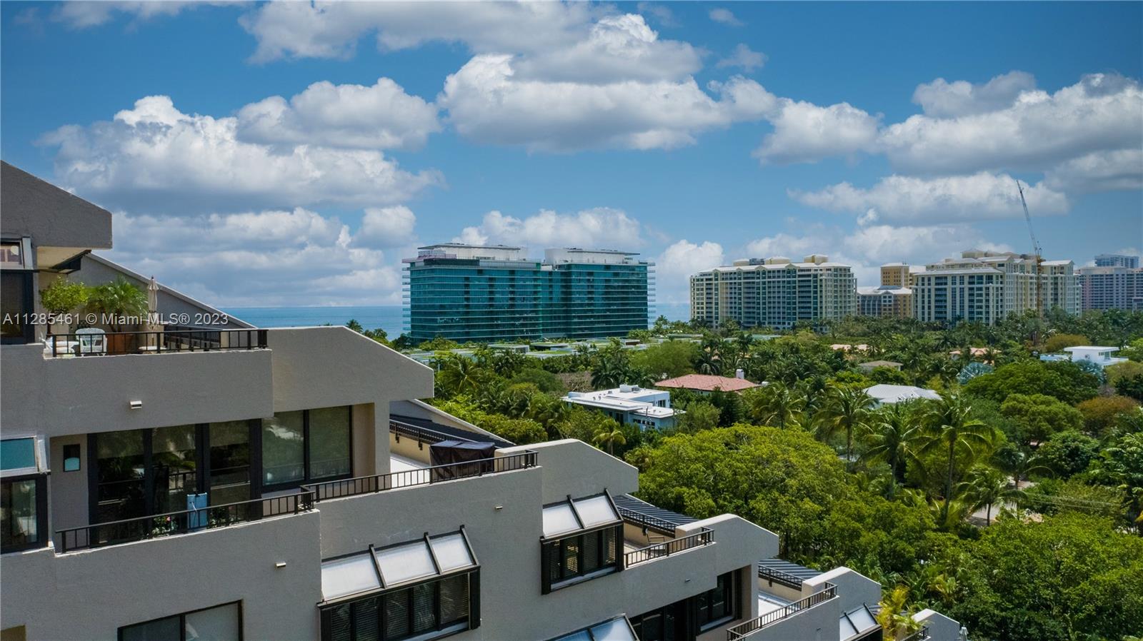 151 Crandon Boulevard, Unit 1023 Key Biscayne, FL 33149 - Photo 2 of 55 a view of a city from a balcony
