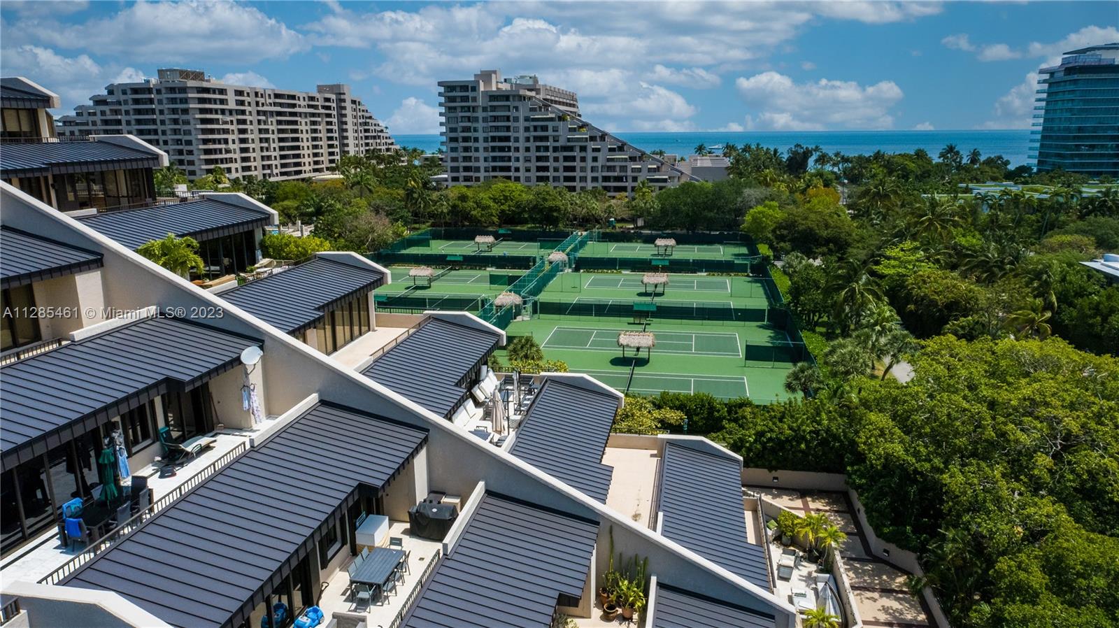 151 Crandon Boulevard, Unit 1023 Key Biscayne, FL 33149 - Photo 5 of 55 a view of a balcony with a yard