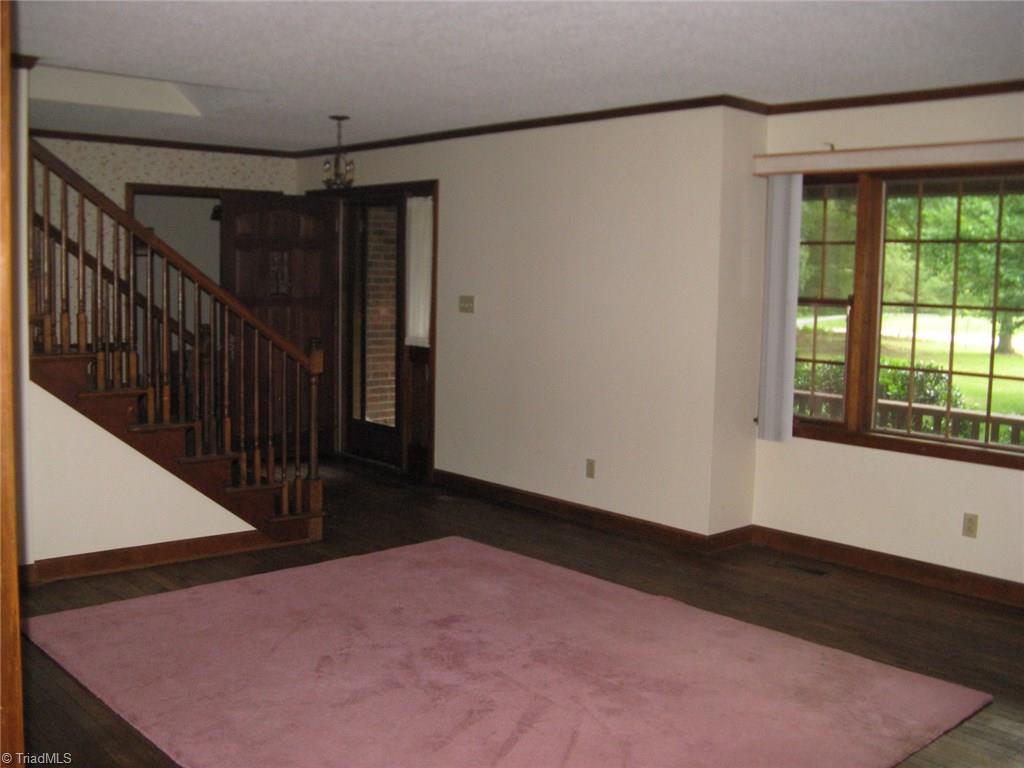 5204 Saddle Brook Road Oak Ridge, NC 27310 - Photo 13 of 29 Spacious Living Rom With Real Hardwood Floors.