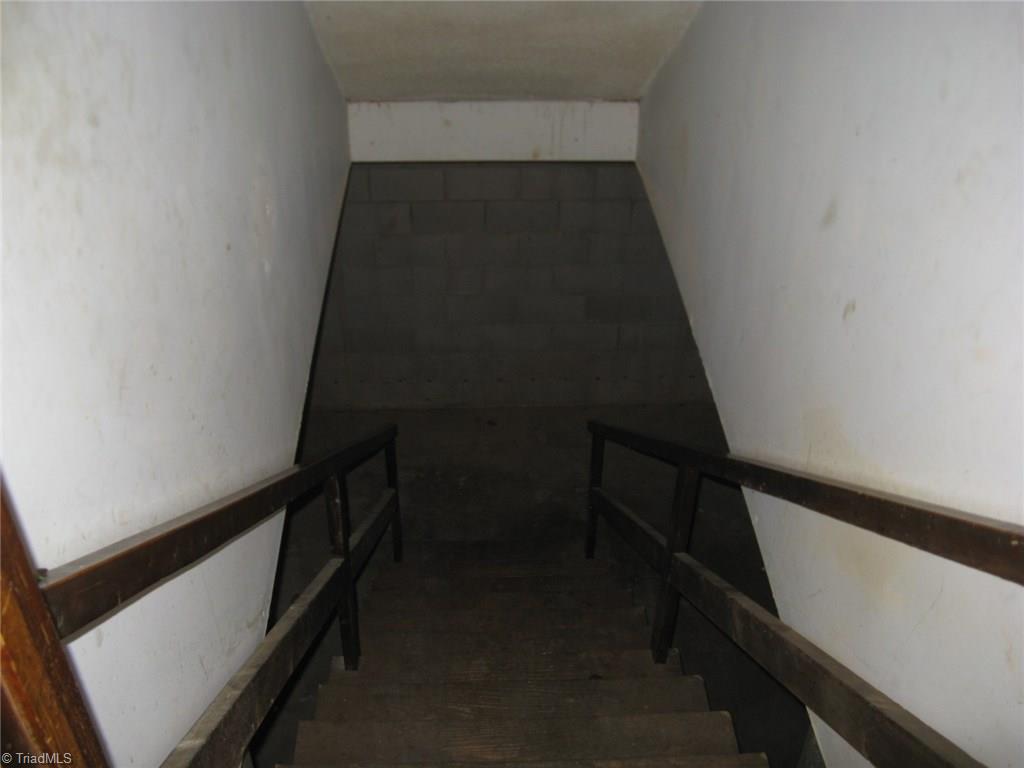 5204 Saddle Brook Road Oak Ridge, NC 27310 - Photo 17 of 29 Stairs to Basement