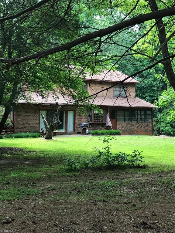 5204 Saddle Brook Road Oak Ridge, NC 27310 - Photo 3 of 29 Back of home with gorgeous Back Yard