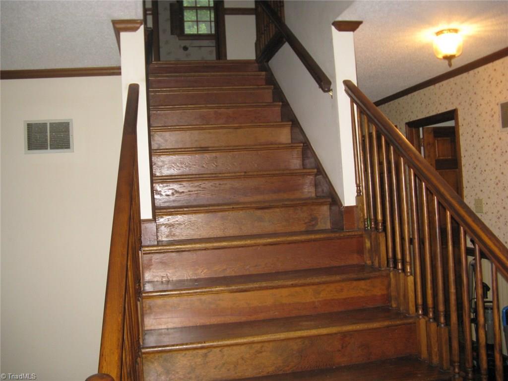 5204 Saddle Brook Road Oak Ridge, NC 27310 - Photo 21 of 29 Stairs to 2nd Floor Living Area