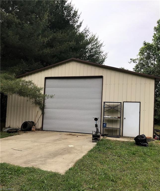 5204 Saddle Brook Road Oak Ridge, NC 27310 - Photo 4 of 29 Huge Garage with Electricity