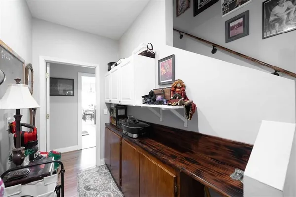 a kitchen with a sink and cabinets
