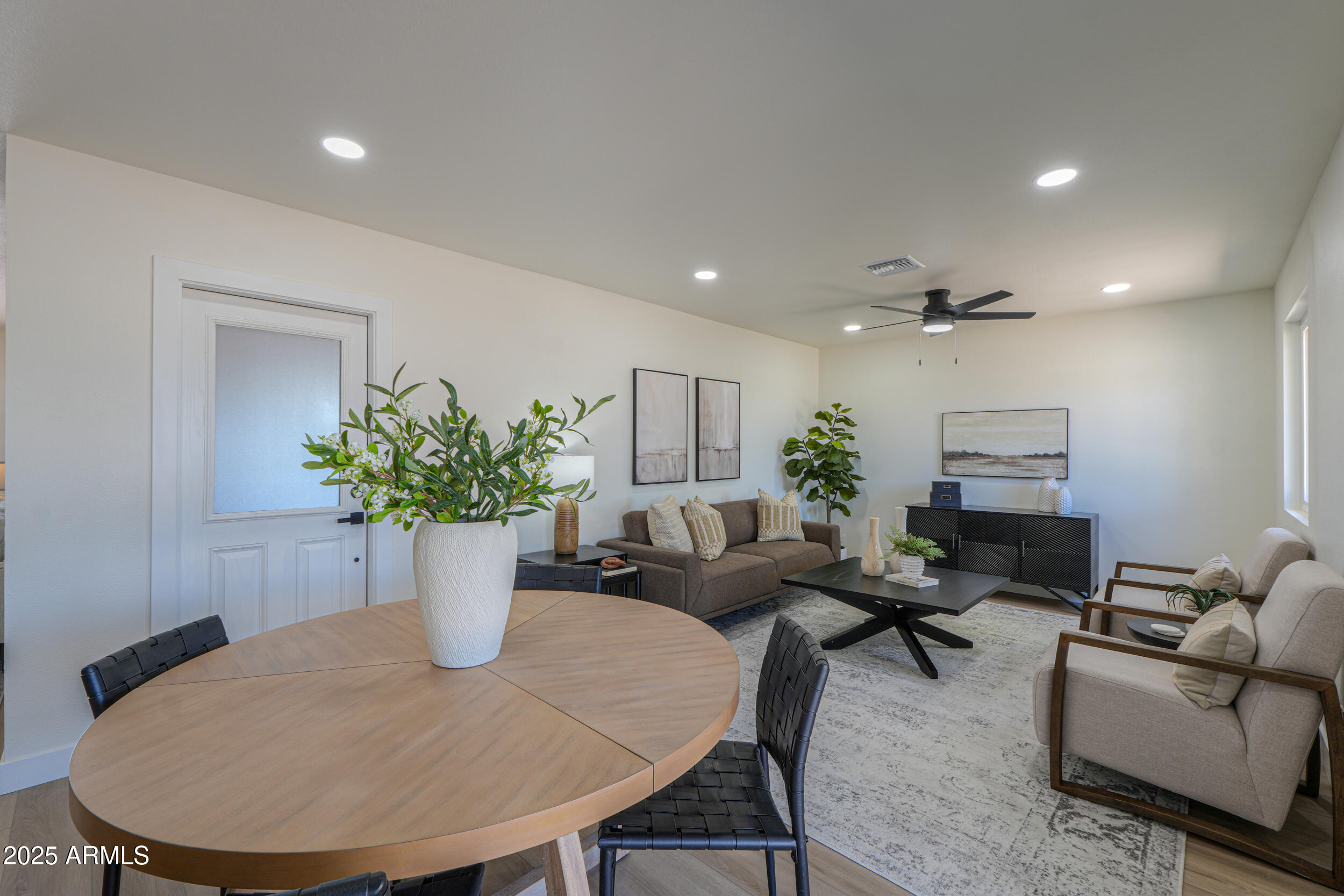 6502 East Rustic Drive Mesa, AZ 85215 - Photo 13 of 40 a living room with furniture flowerpot and a potted plant