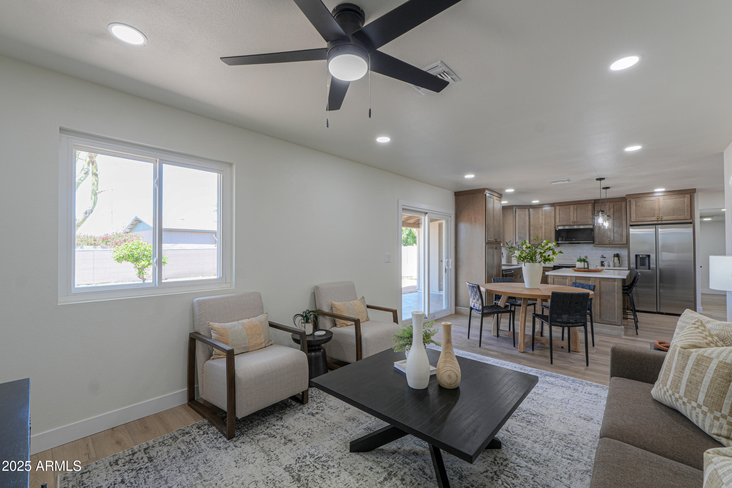 6502 East Rustic Drive Mesa, AZ 85215 - Photo 14 of 40 a living room with furniture and a table