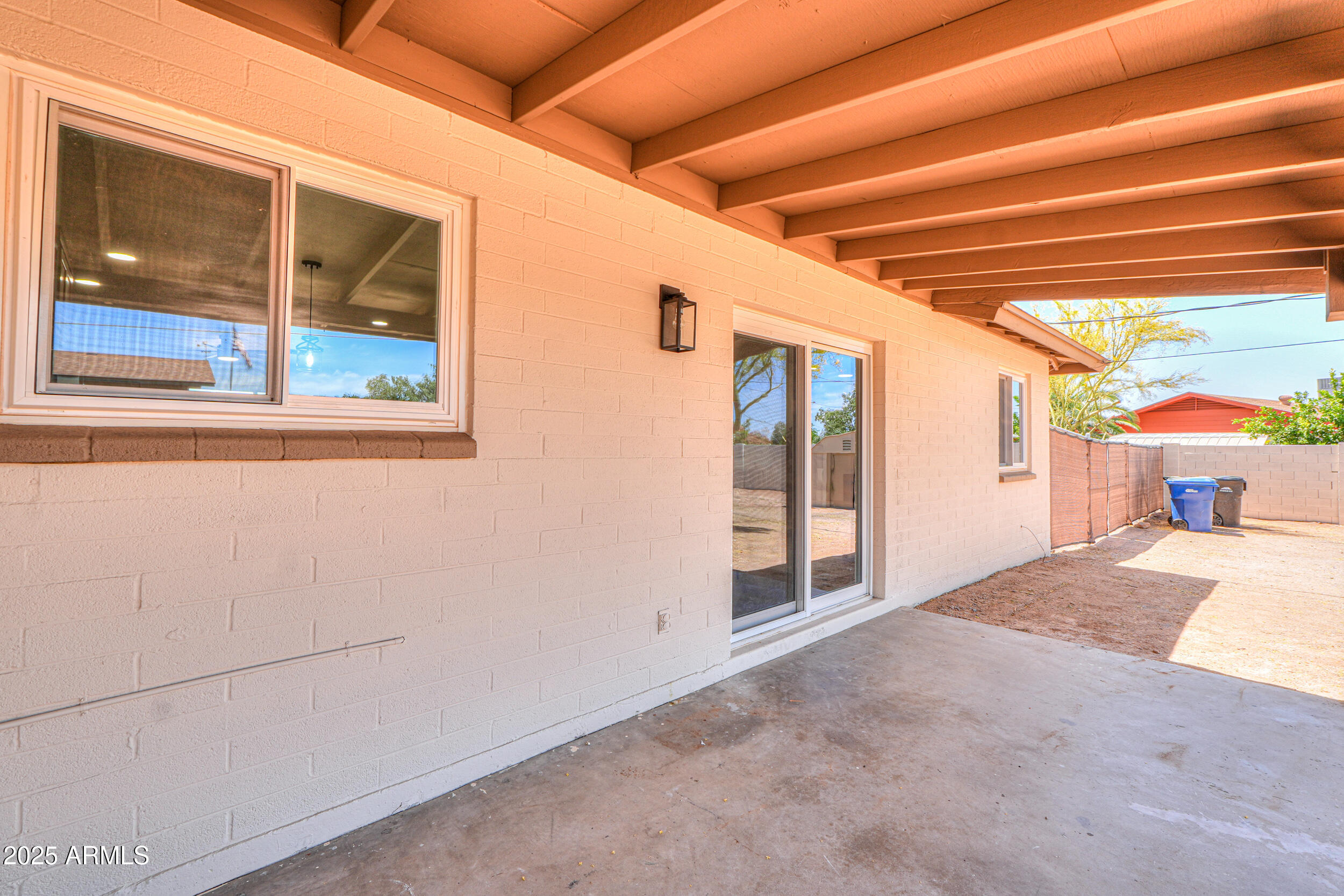 6502 East Rustic Drive Mesa, AZ 85215 - Photo 27 of 40 a view of a room with wooden floor and windows