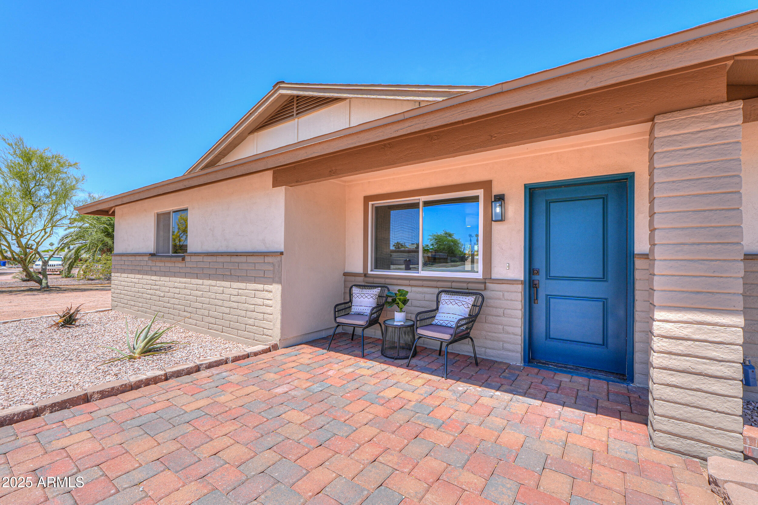 6502 East Rustic Drive Mesa, AZ 85215 - Photo 31 of 40 a backyard of a house with outdoor seating
