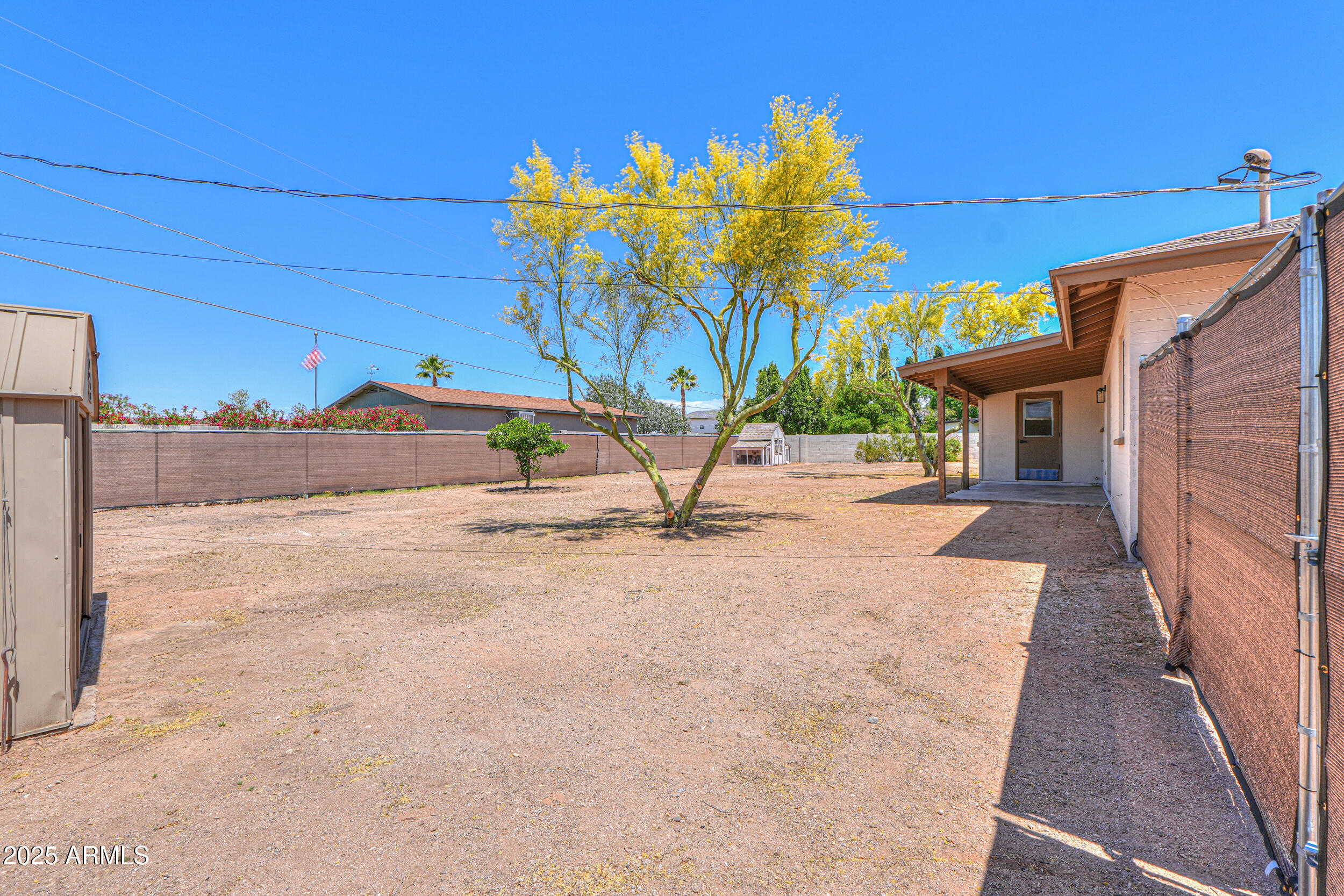 6502 East Rustic Drive Mesa, AZ 85215 - Photo 32 of 40 a view of a street with a building in the background