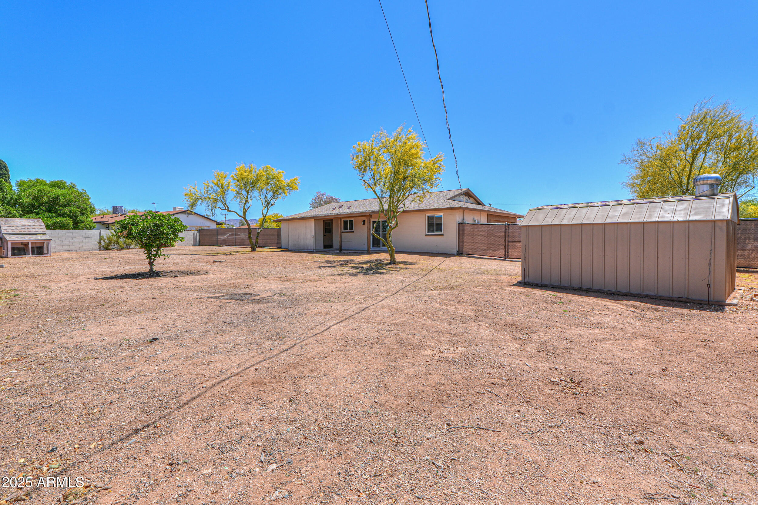 6502 East Rustic Drive Mesa, AZ 85215 - Photo 33 of 40 a view of a house with a outdoor space