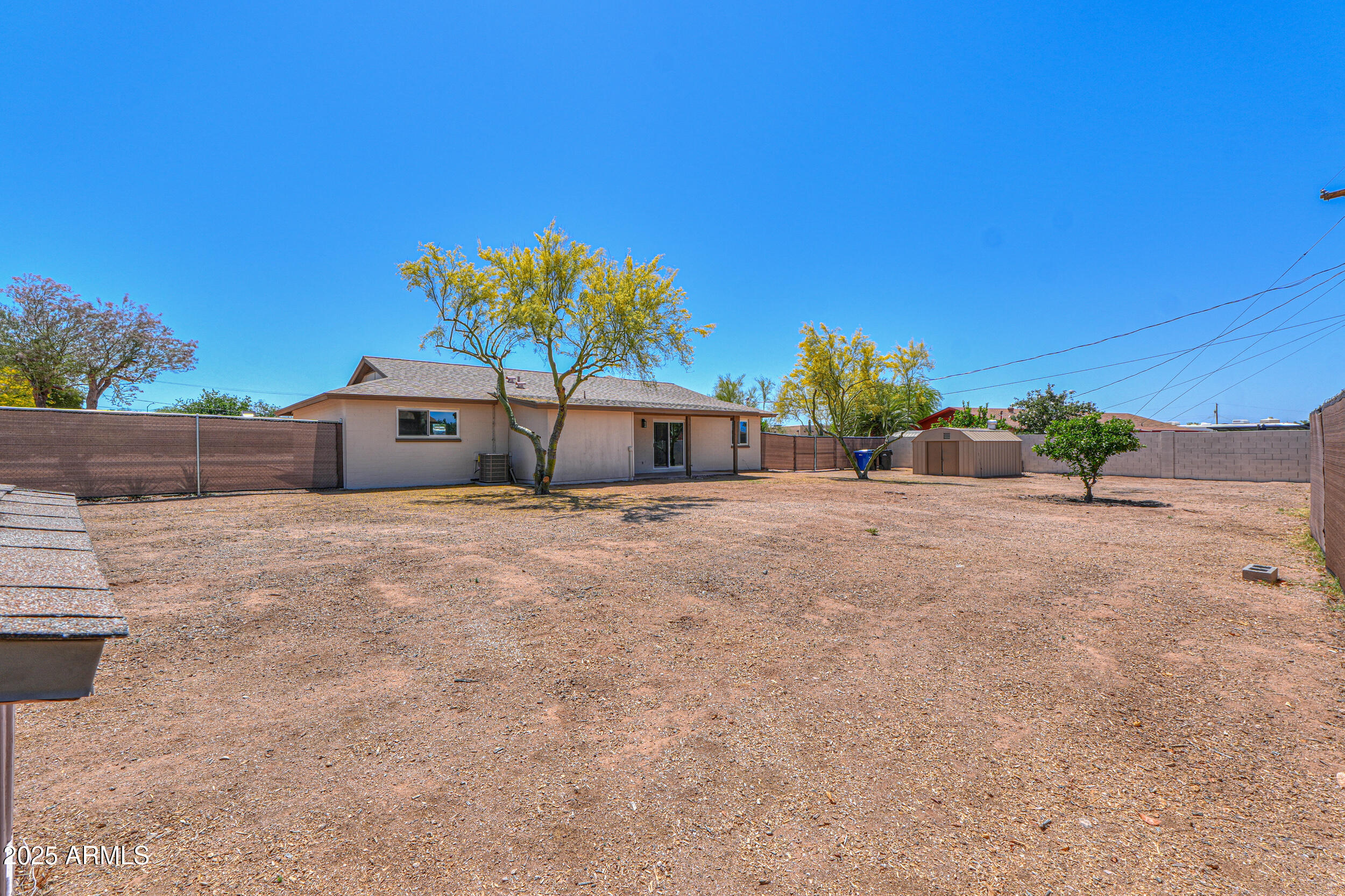 6502 East Rustic Drive Mesa, AZ 85215 - Photo 34 of 40 a house with a yard