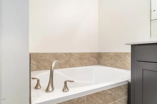 a bathroom with a bathtub