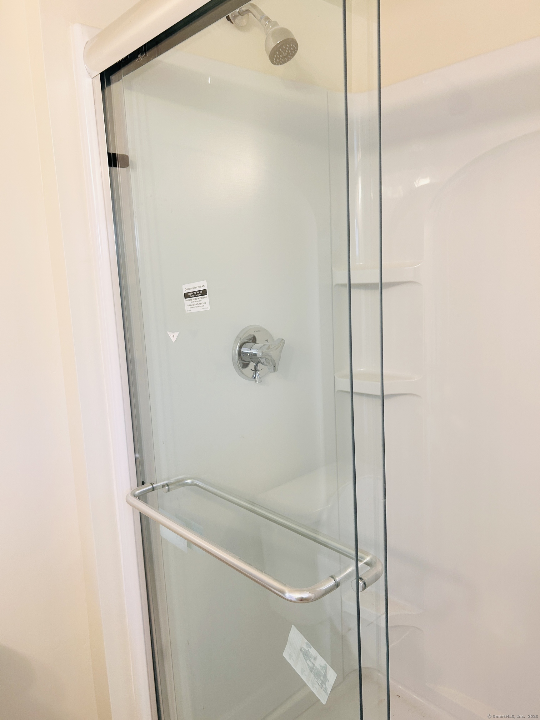 6-5 5th Street, Unit 6 Madison, CT 06443 - Photo 28 of 29 a bathroom with a shower