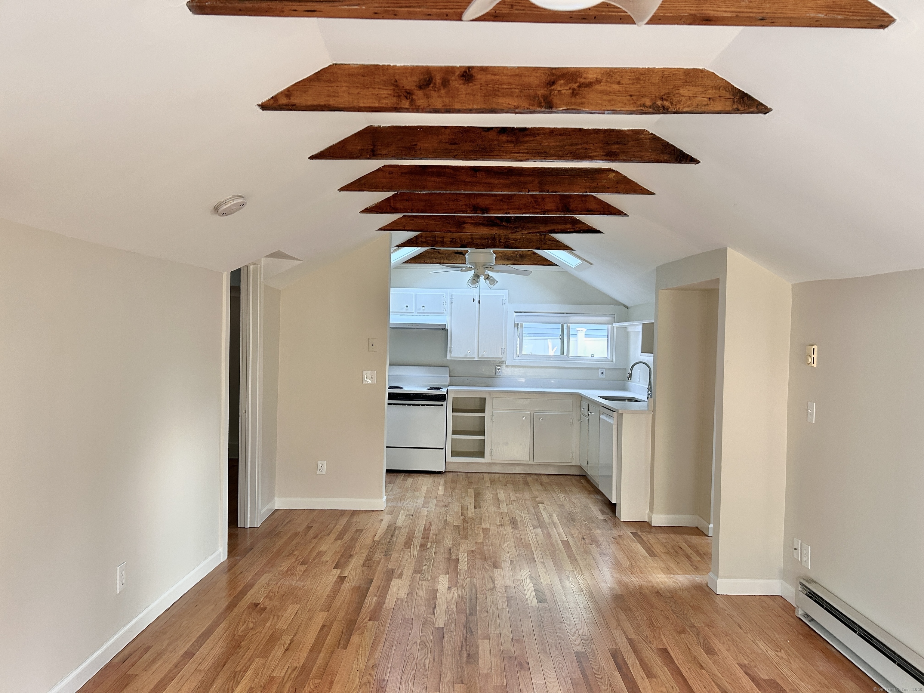 6-5 5th Street, Unit 6 Madison, CT 06443 - Photo 5 of 29 a view of entryway and kitchen