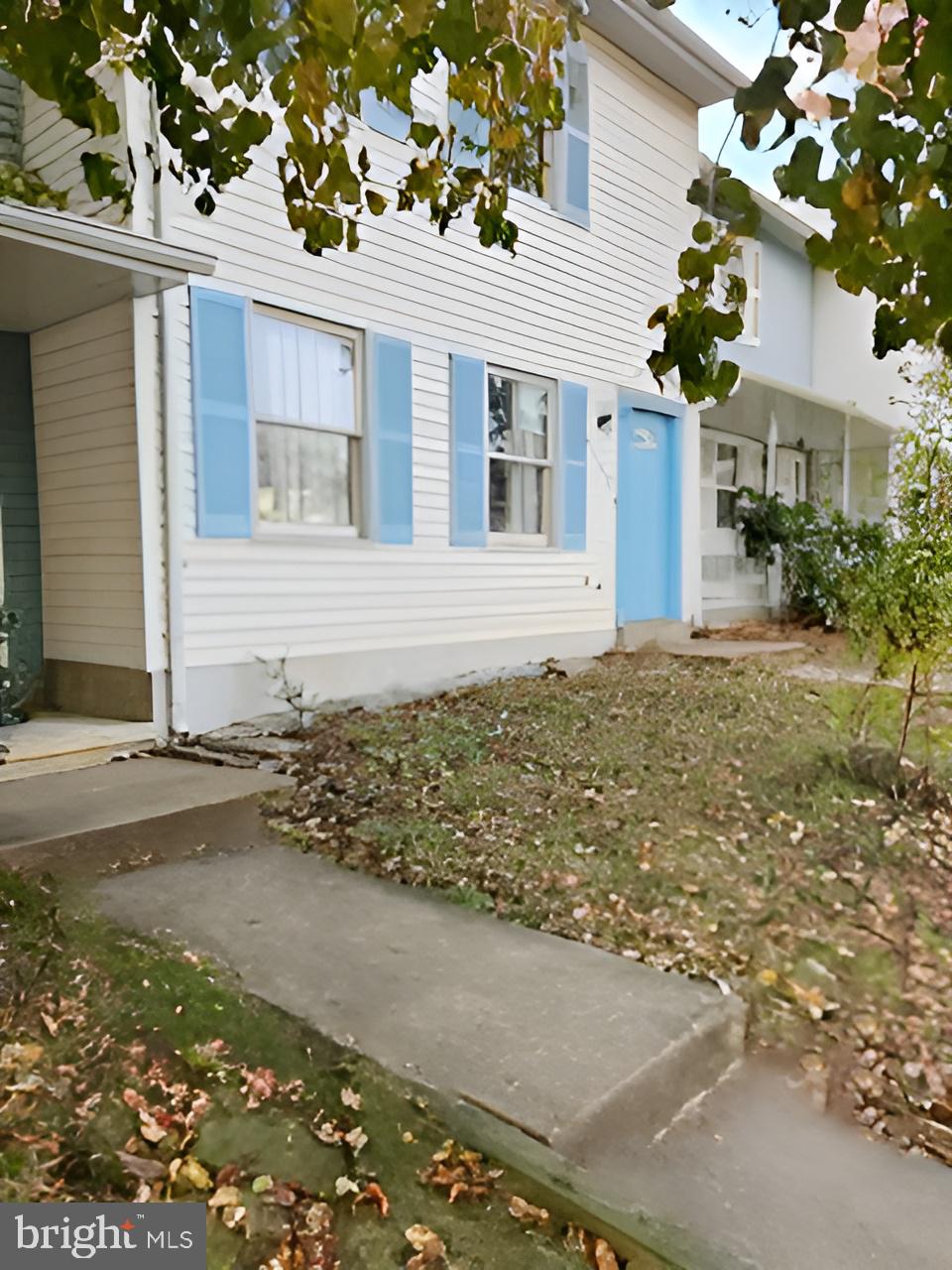 5140 Redbud Road Fredericksburg, VA 22407 - Photo 5 of 8 a front view of a house with garden