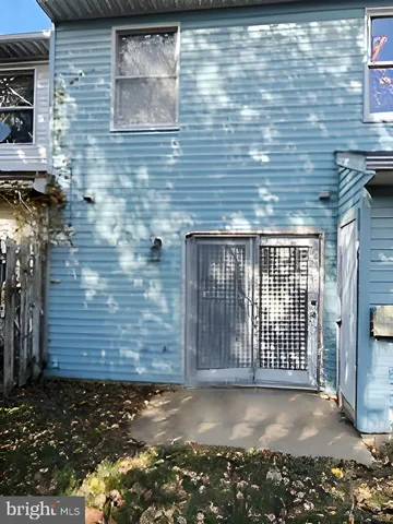 a view of a brick house with a street