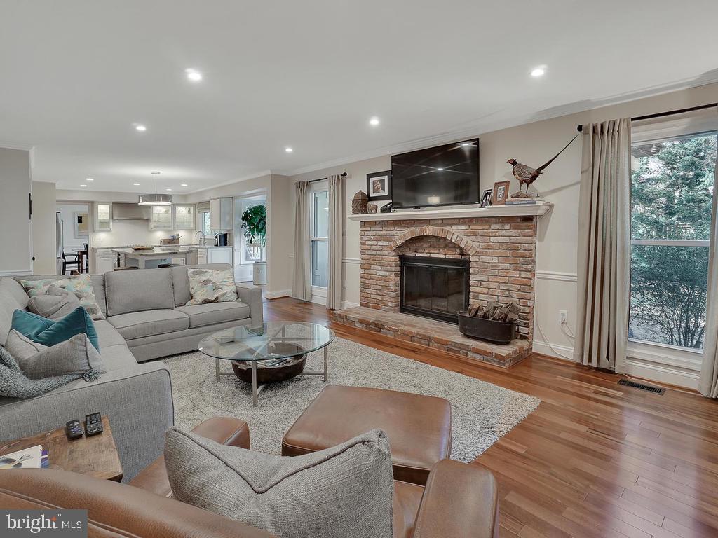 12101 Triple Crown Road Gaithersburg, MD 20878 - Photo 16 of 42 Family Room w/ Brick Fireplace