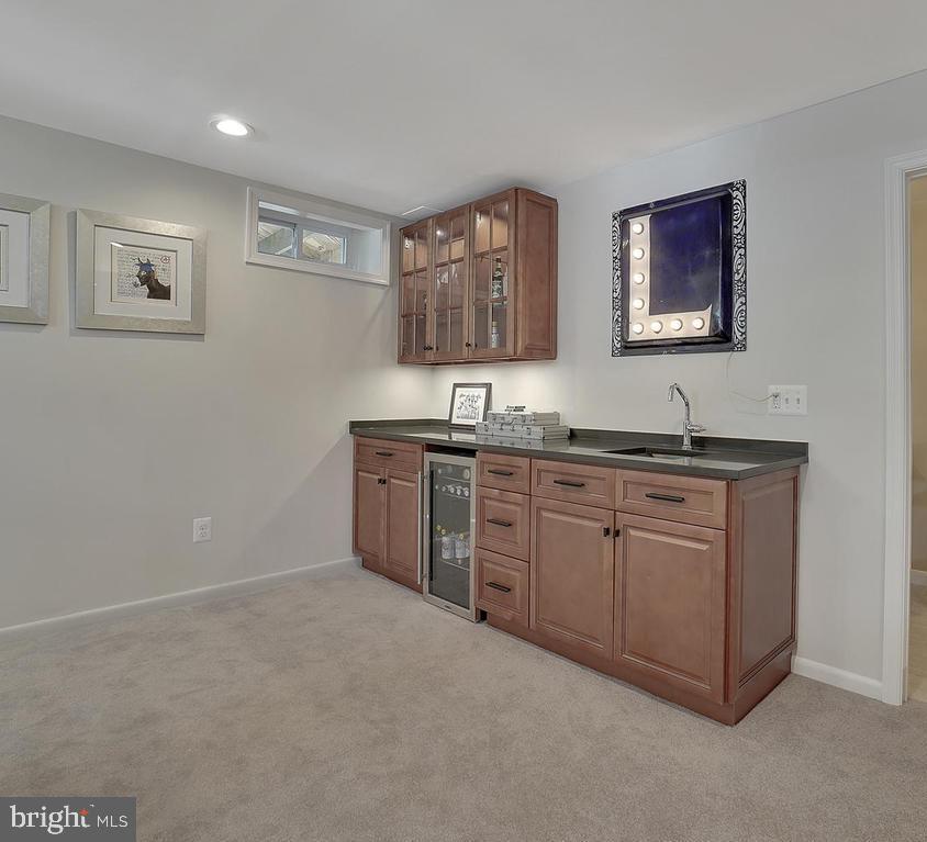 12101 Triple Crown Road Gaithersburg, MD 20878 - Photo 35 of 42 Finished Lower Level w/ Wet Bar