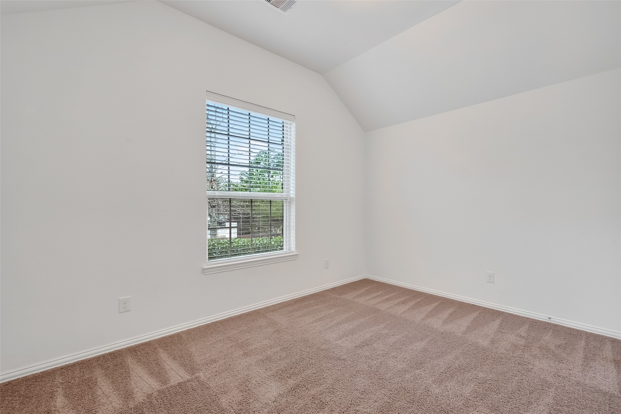 210 Emory Birch Montgomery, TX 77316 - Photo 12 of 48 an empty room with a window