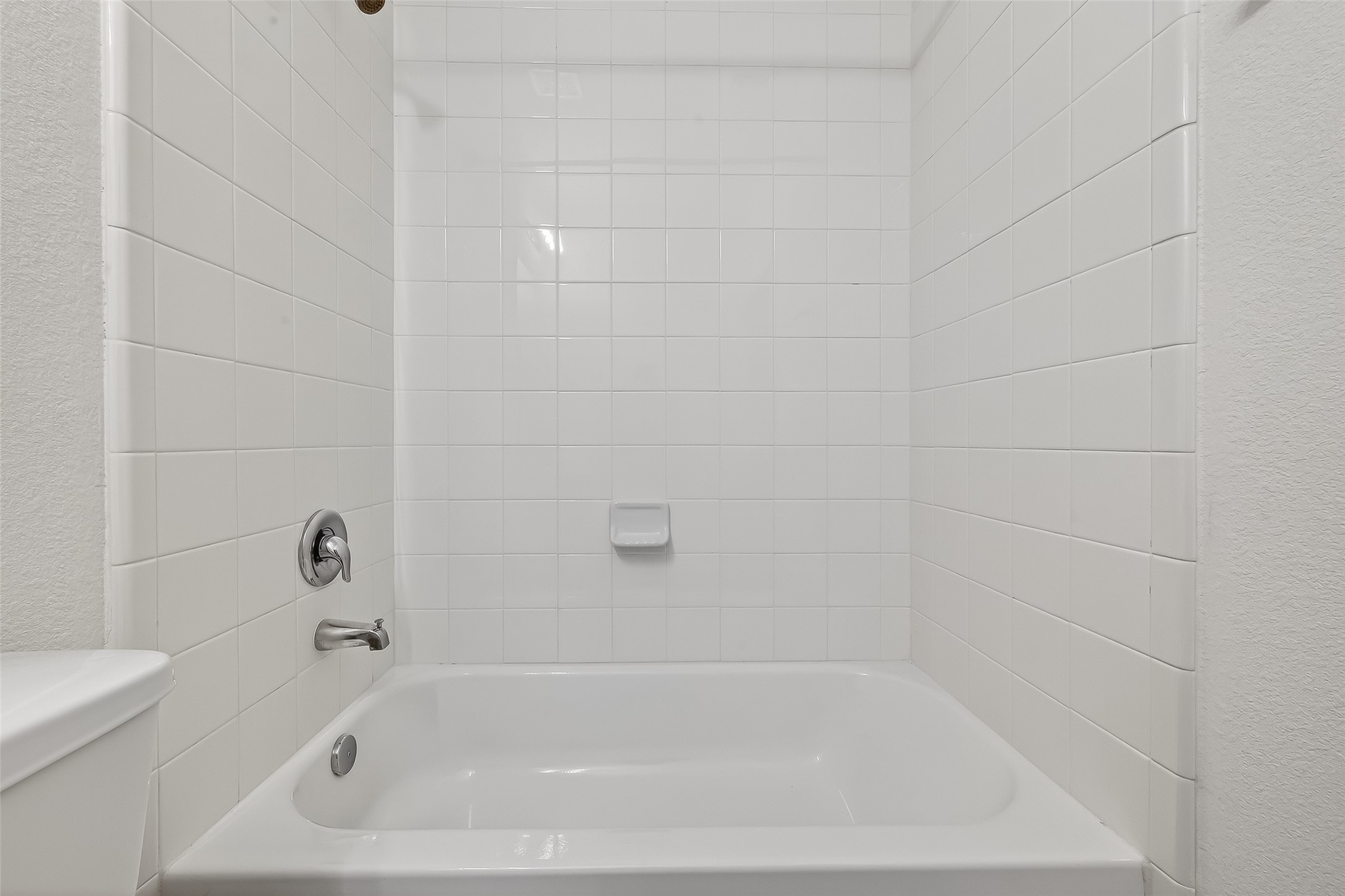 210 Emory Birch Montgomery, TX 77316 - Photo 35 of 48 a white bath tub sitting next to a white sink and vanity