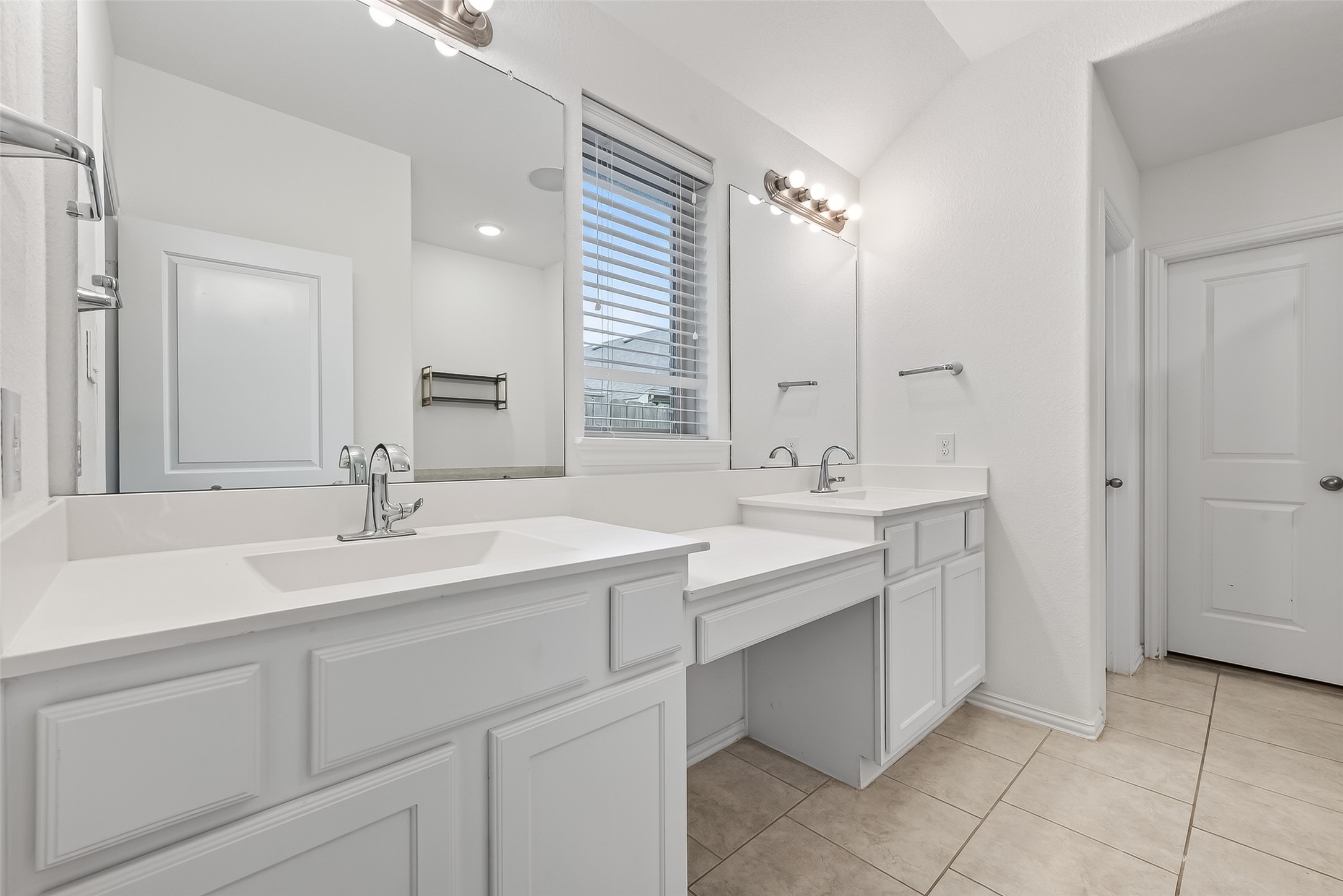 210 Emory Birch Montgomery, TX 77316 - Photo 37 of 48 a bathroom with a double vanity sink mirror and