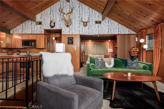 a view of a patio with a table and chairs