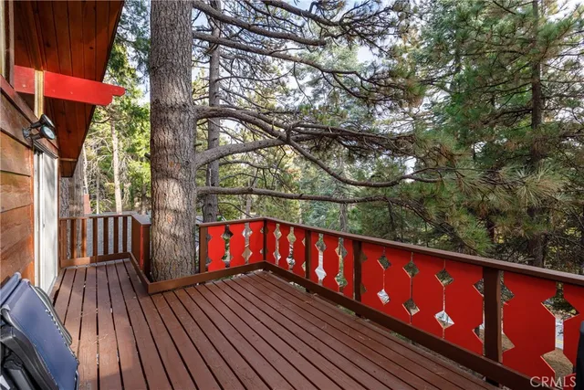 a view of balcony with wooden floor and outdoor space