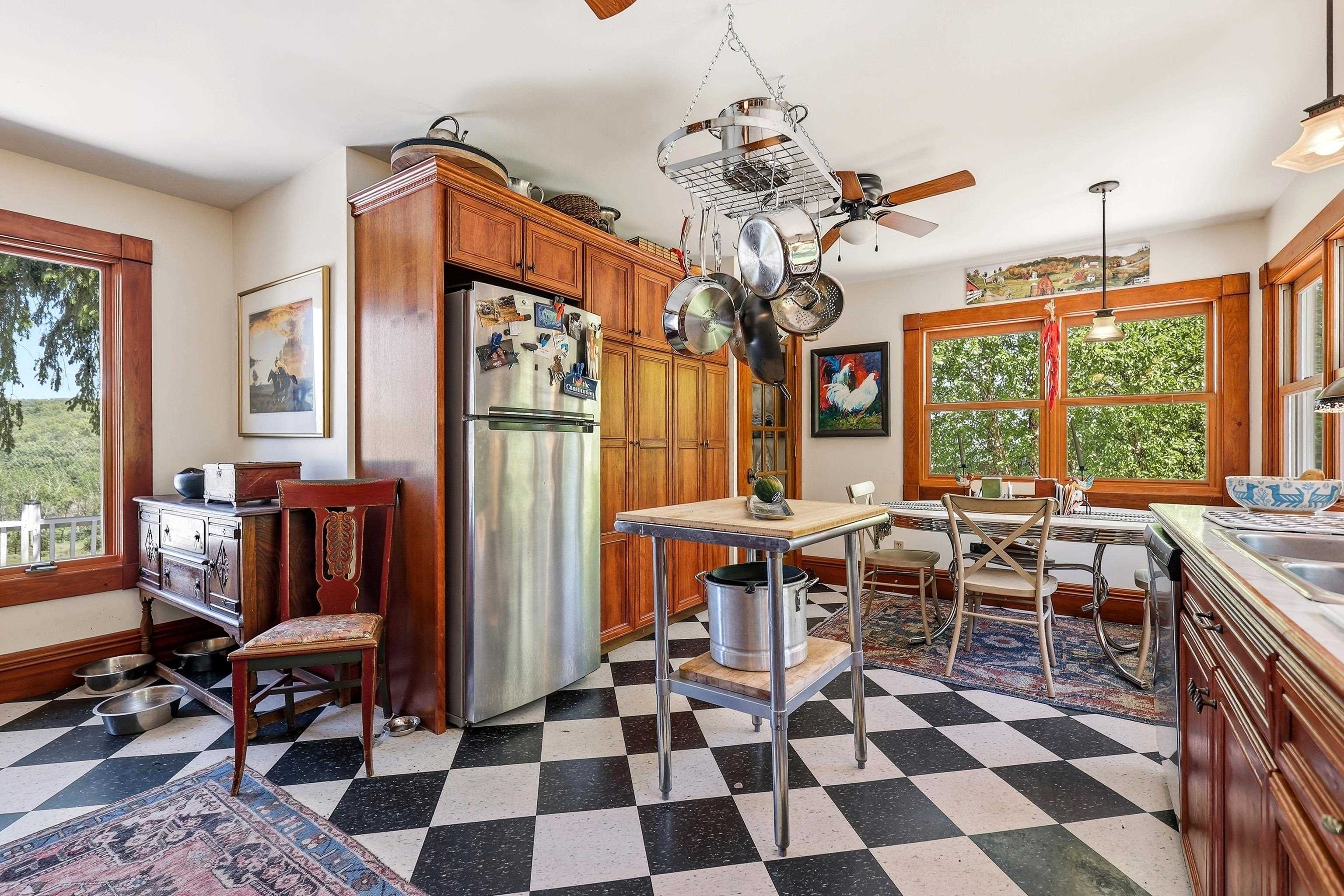 2181 South Irish Hollow Road Galena, IL 61036 - Photo 23 of 48 a view of a dining room with furniture wooden floor and chandelier
