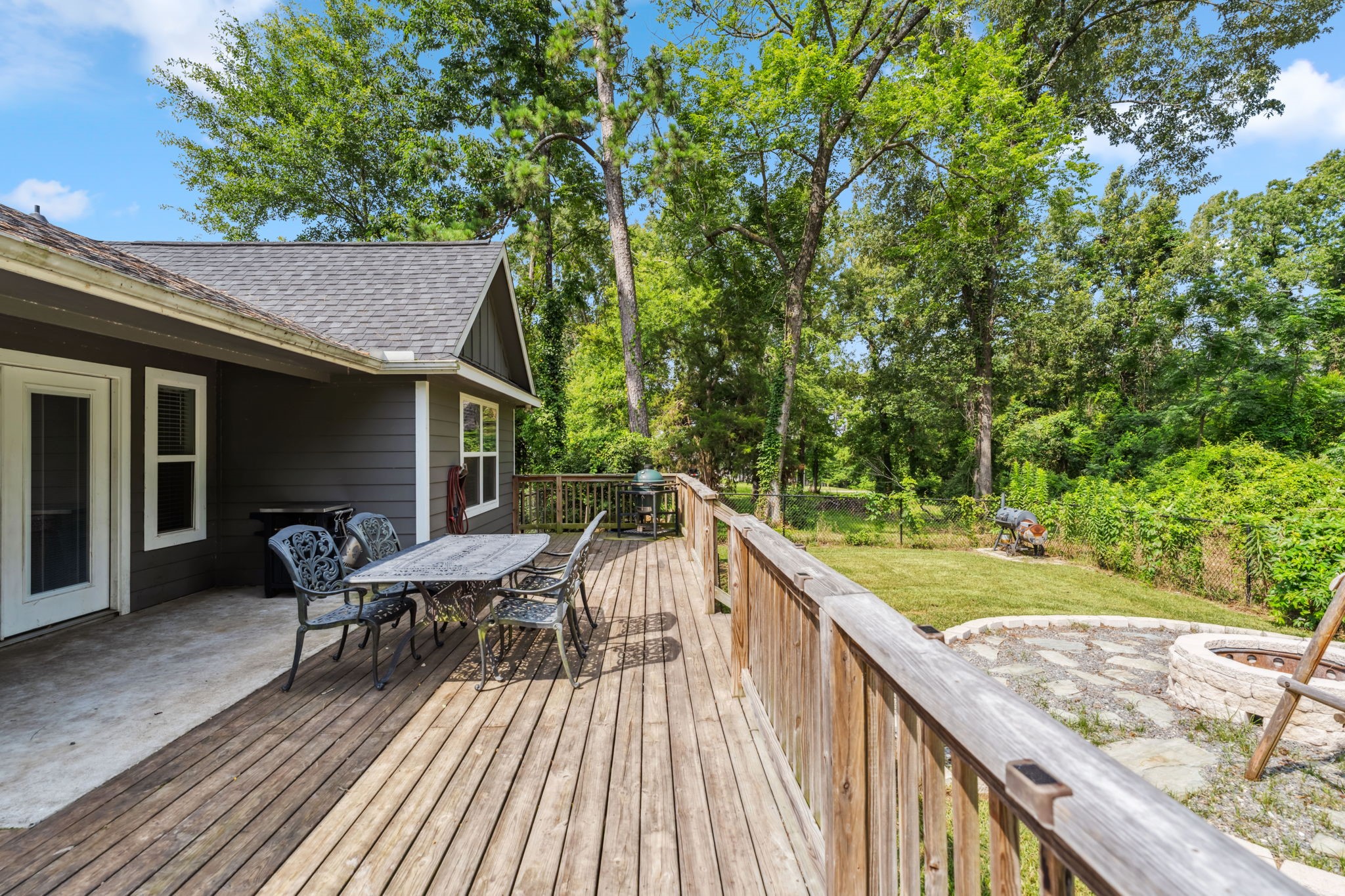129 Bridgepoint Onalaska, TX 77360 - Photo 27 of 35 a balcony with wooden floor and outdoor seating