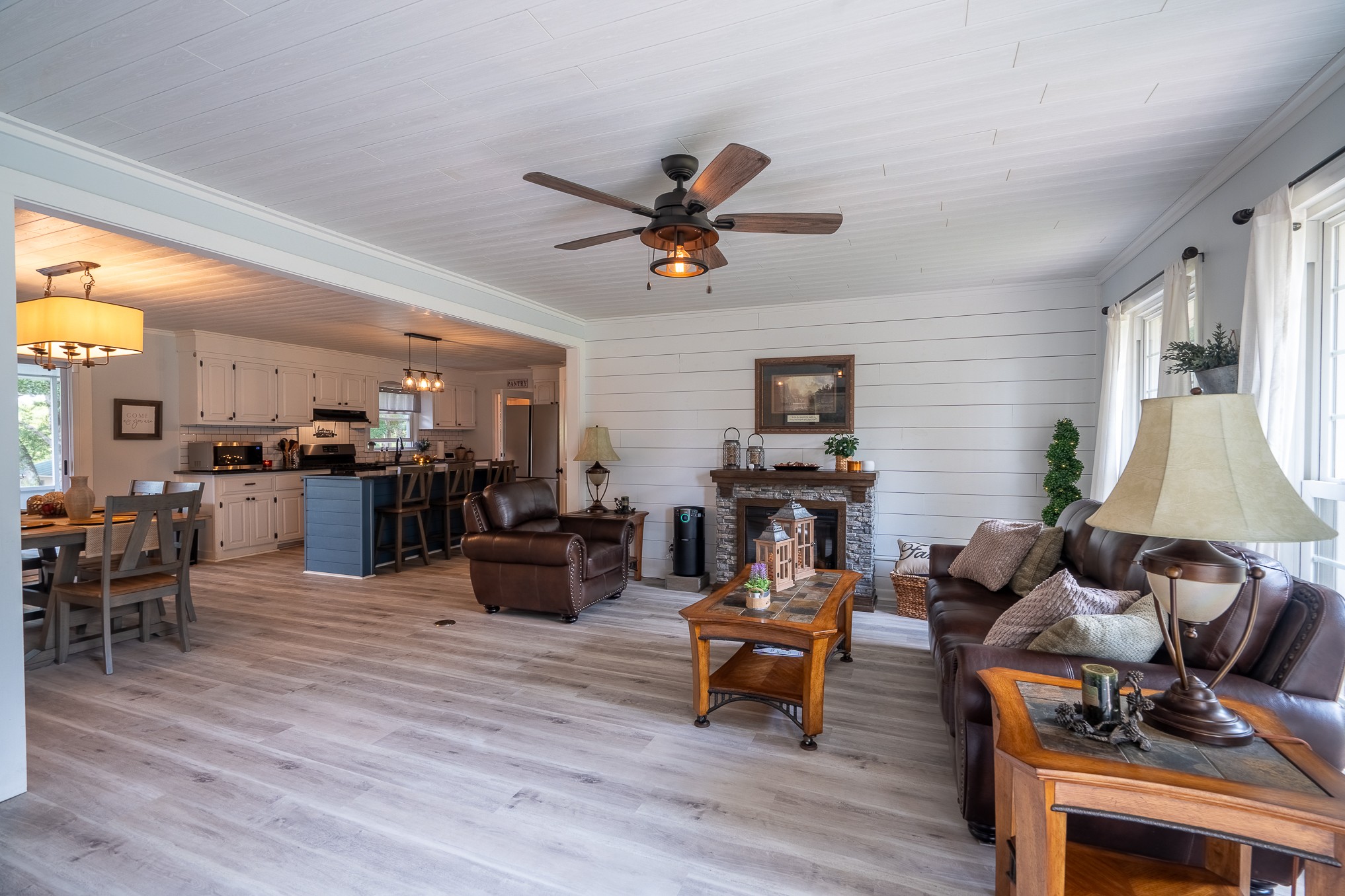 12 Horseshoe Bend Road Leoma, TN 38468 - Photo 2 of 51 a living room with furniture and a flat screen tv