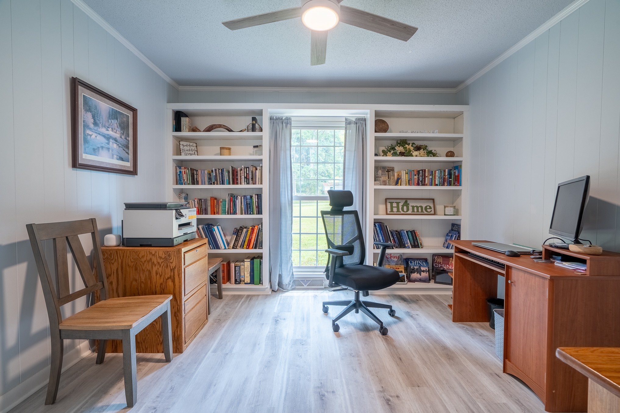 12 Horseshoe Bend Road Leoma, TN 38468 - Photo 24 of 51 a view of a workspace with furniture and a bookshelf