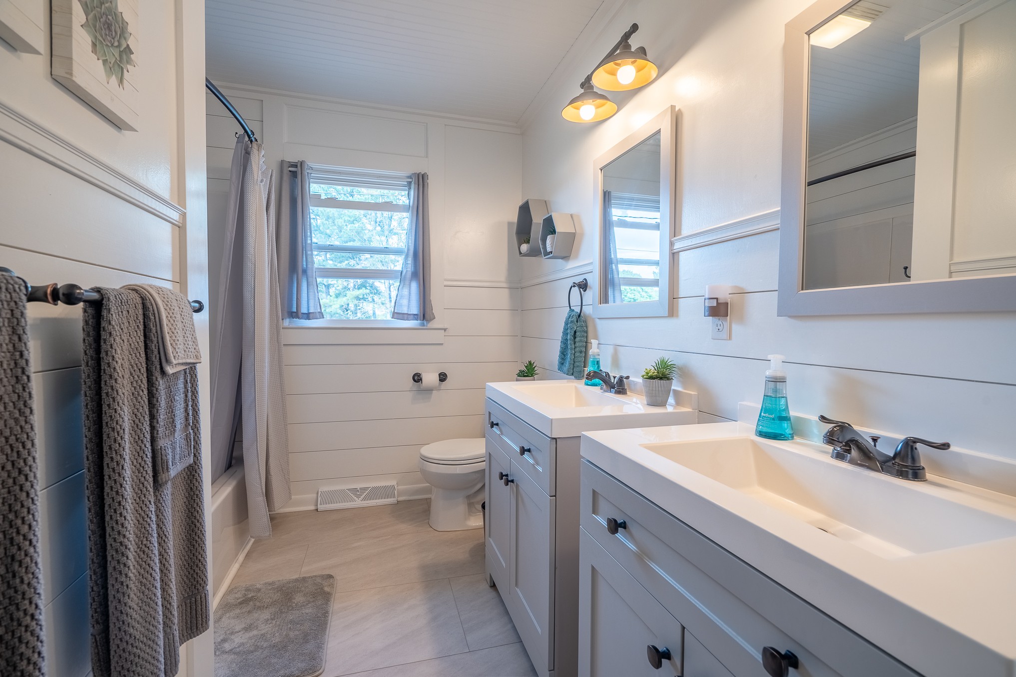 12 Horseshoe Bend Road Leoma, TN 38468 - Photo 27 of 51 a bathroom with a sink a toilet and a mirror