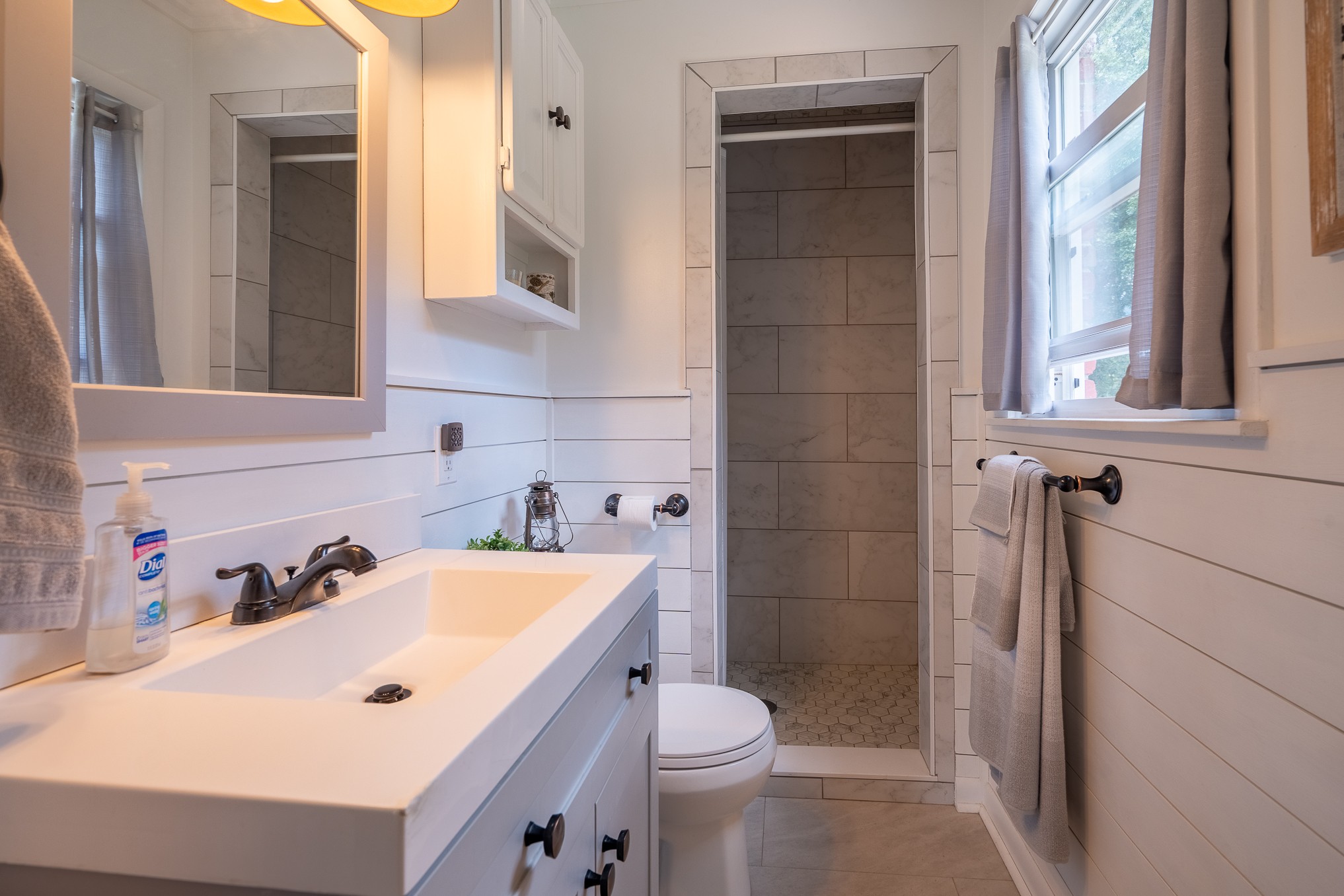 12 Horseshoe Bend Road Leoma, TN 38468 - Photo 31 of 51 a bathroom with a sink a toilet and shower