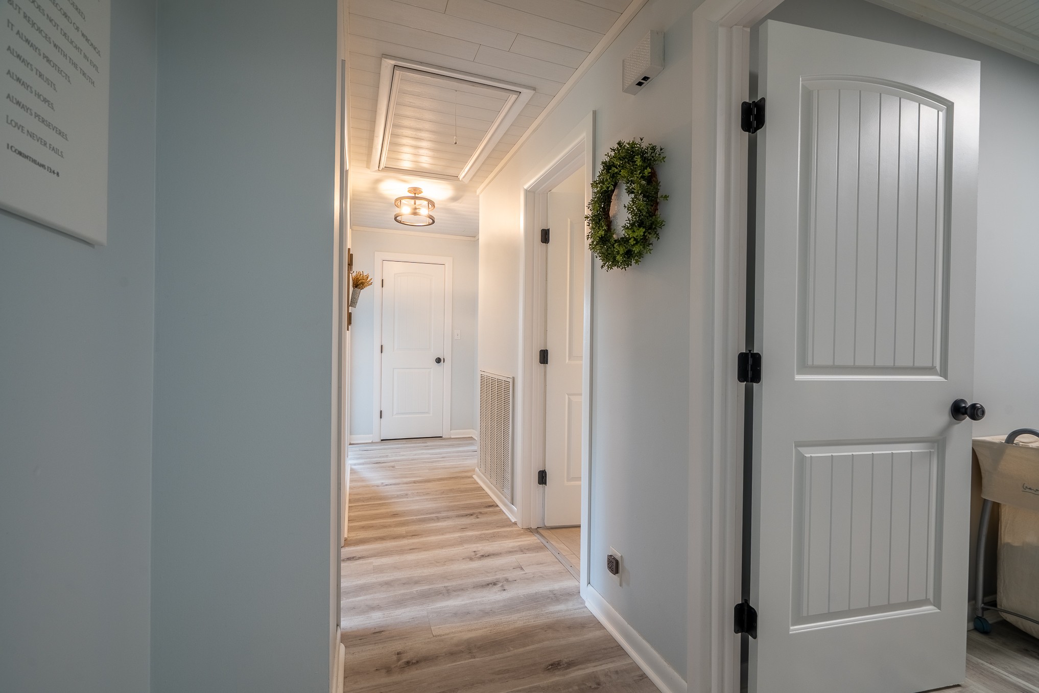 12 Horseshoe Bend Road Leoma, TN 38468 - Photo 32 of 51 a view of a hallway with wooden floor and closet