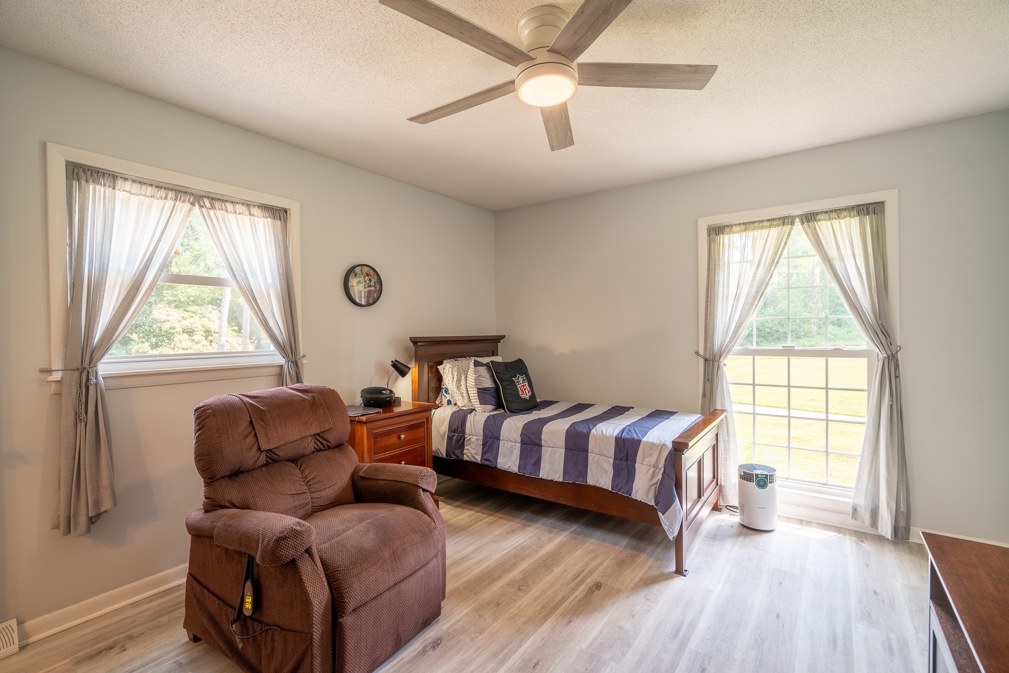 12 Horseshoe Bend Road Leoma, TN 38468 - Photo 34 of 51 a living room with a bed furniture and a window