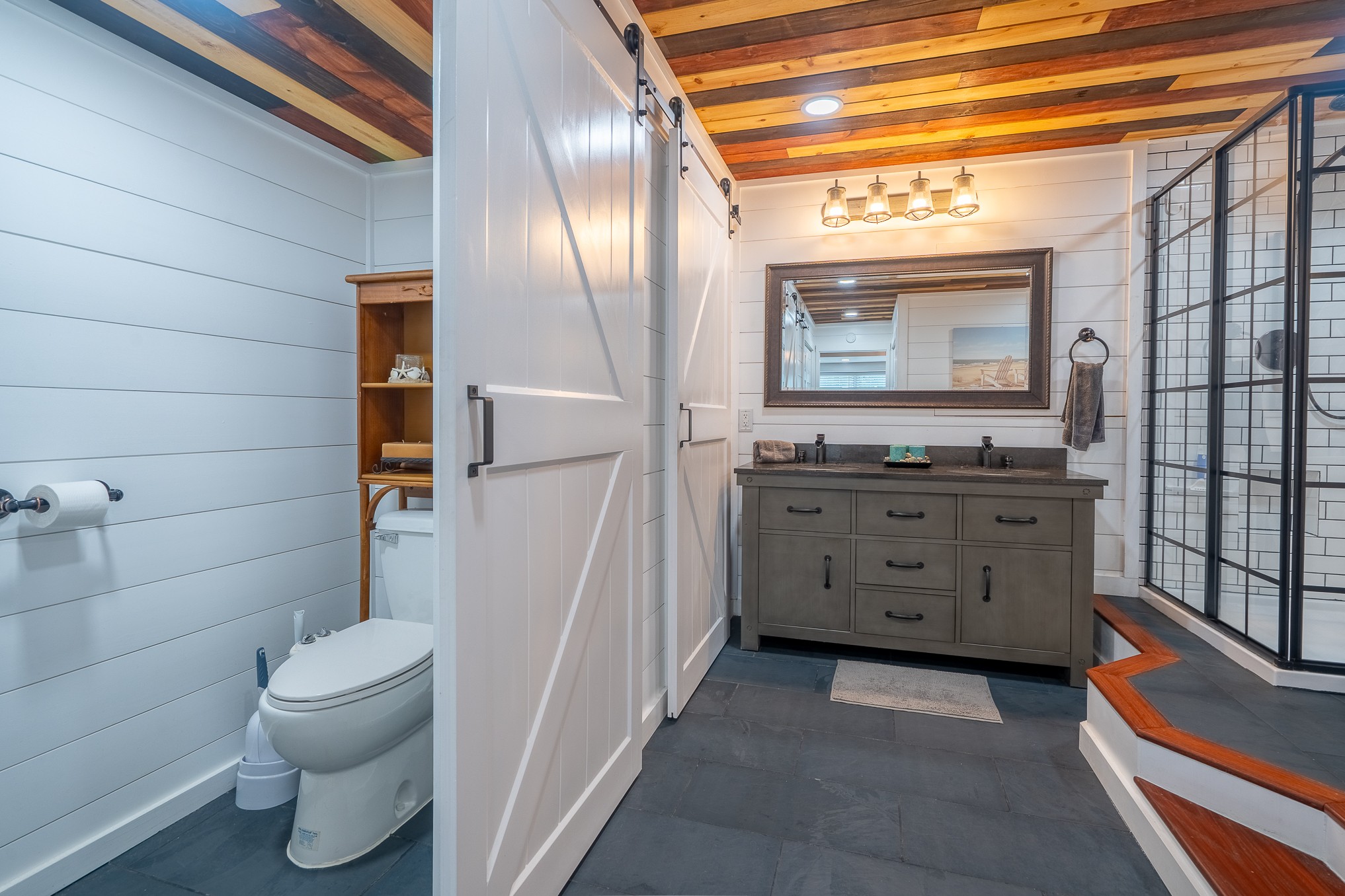 12 Horseshoe Bend Road Leoma, TN 38468 - Photo 37 of 51 a bathroom with a double vanity sink toilet and shower