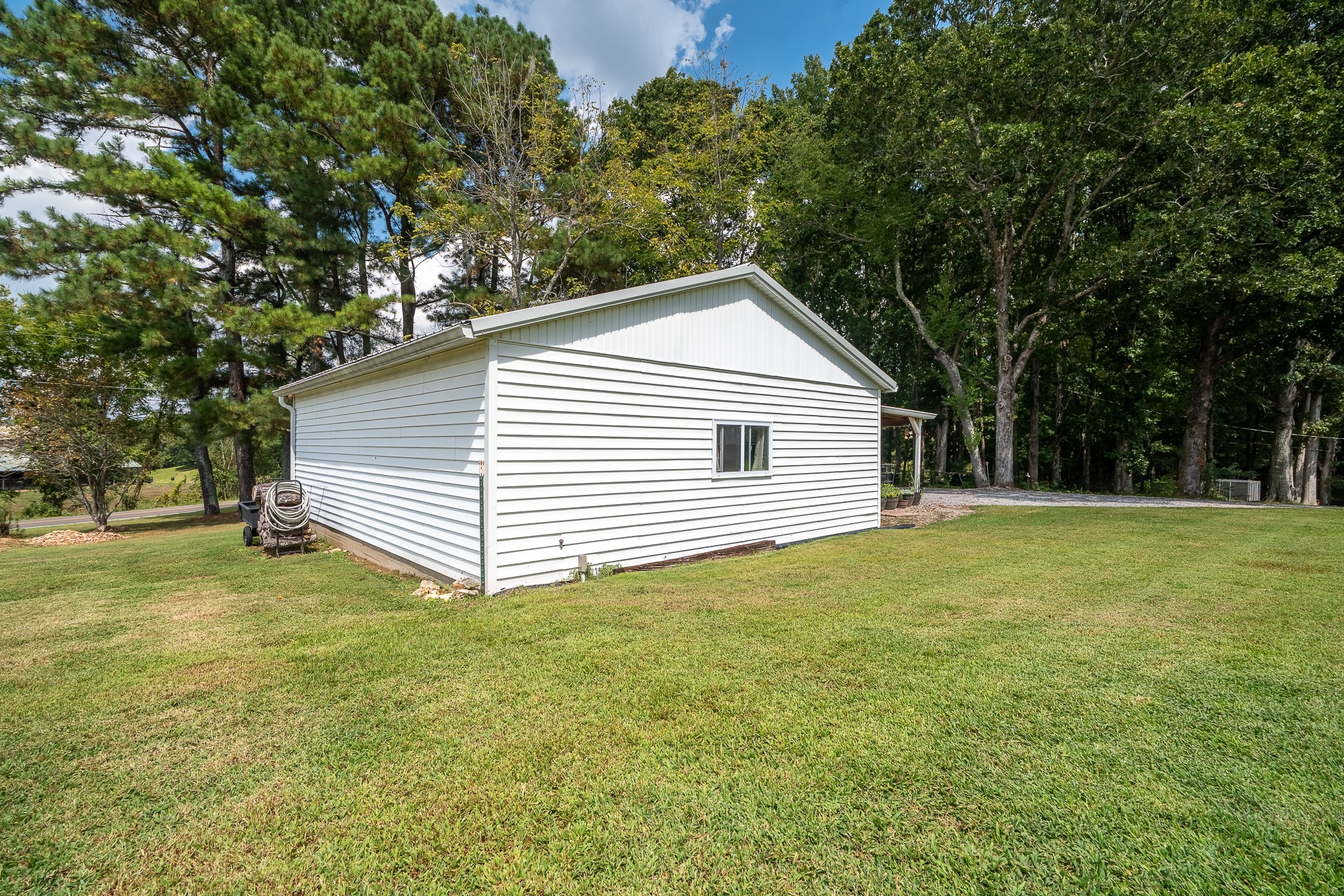 12 Horseshoe Bend Road Leoma, TN 38468 - Photo 48 of 51 a view of a house with a backyard