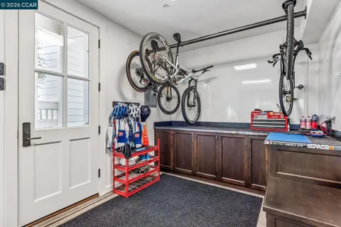 a kitchen with stainless steel appliances granite countertop a stove and a sink