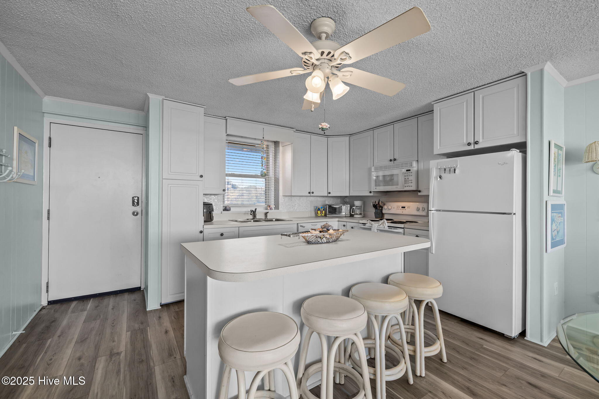 2305 West Fort Macon Road, Unit 101 Atlantic Beach, NC 28512 - Photo 5 of 20 extra seating at the island