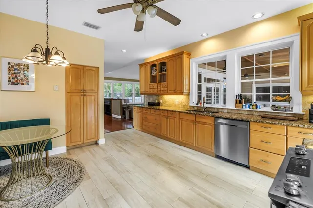 a dining room with furniture and window