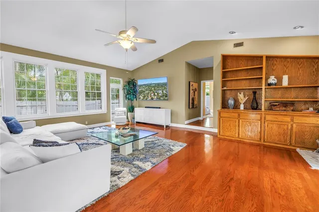 a living room with large window