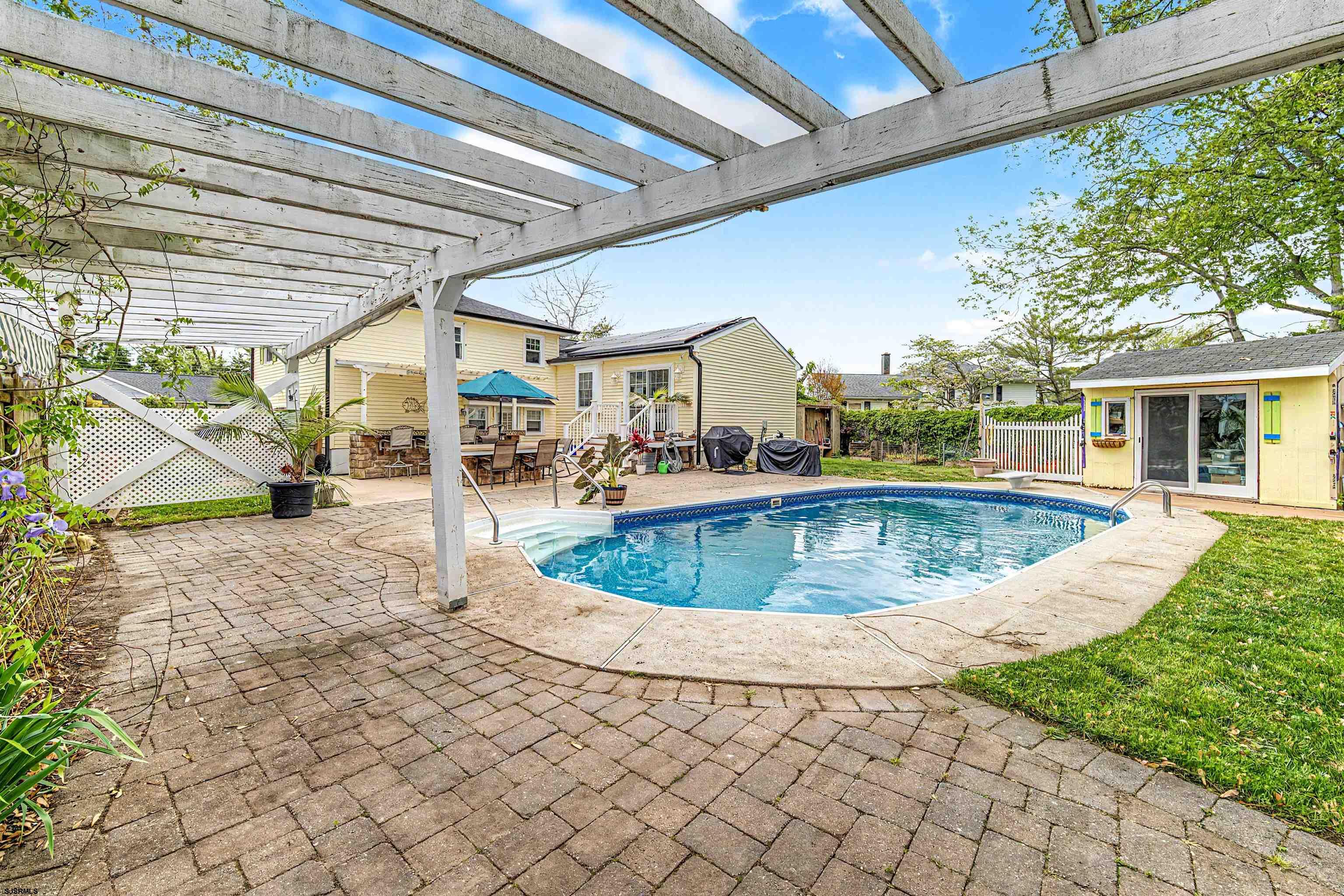125 Exton Road Somers Point, NJ 08244 - Photo 27 of 35 a view of a swimming pool with a patio