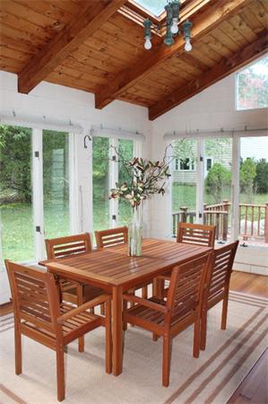 1 Bushnell Drive Lexington, MA 02421 - Photo 11 of 20 a view of an outside dining space with furniture window and outside view