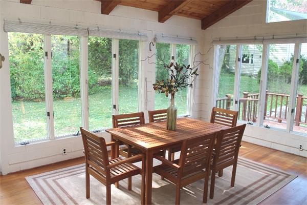 1 Bushnell Drive Lexington, MA 02421 - Photo 12 of 20 a view of a dining room with furniture window and wooden floor