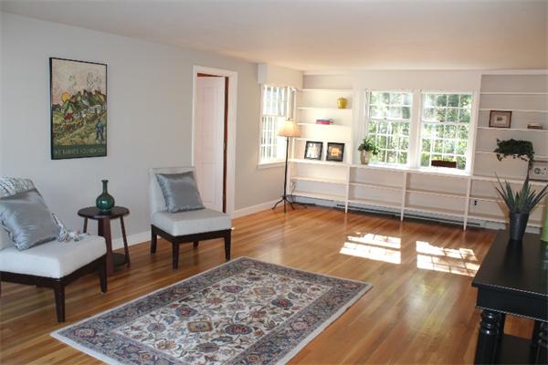 1 Bushnell Drive Lexington, MA 02421 - Photo 2 of 20 a living room with furniture and a rug