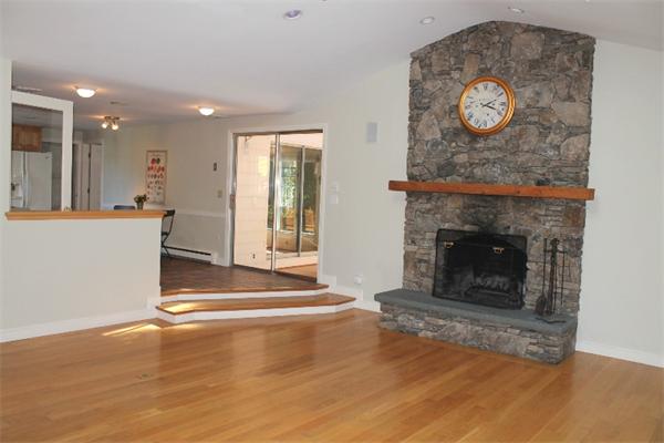 1 Bushnell Drive Lexington, MA 02421 - Photo 7 of 20 a view of fireplace with wooden floor