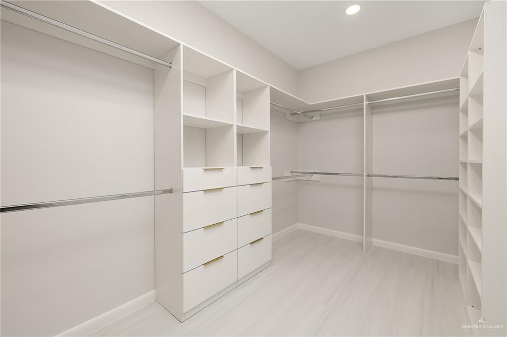 9119 North 25th Street McAllen, TX 78504 - Photo 18 of 22 a view of an empty walk in closet