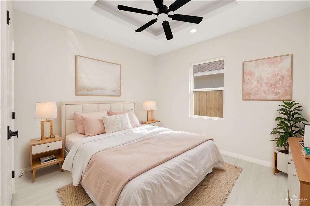 9119 North 25th Street McAllen, TX 78504 - Photo 20 of 22 a bedroom with bed and a window